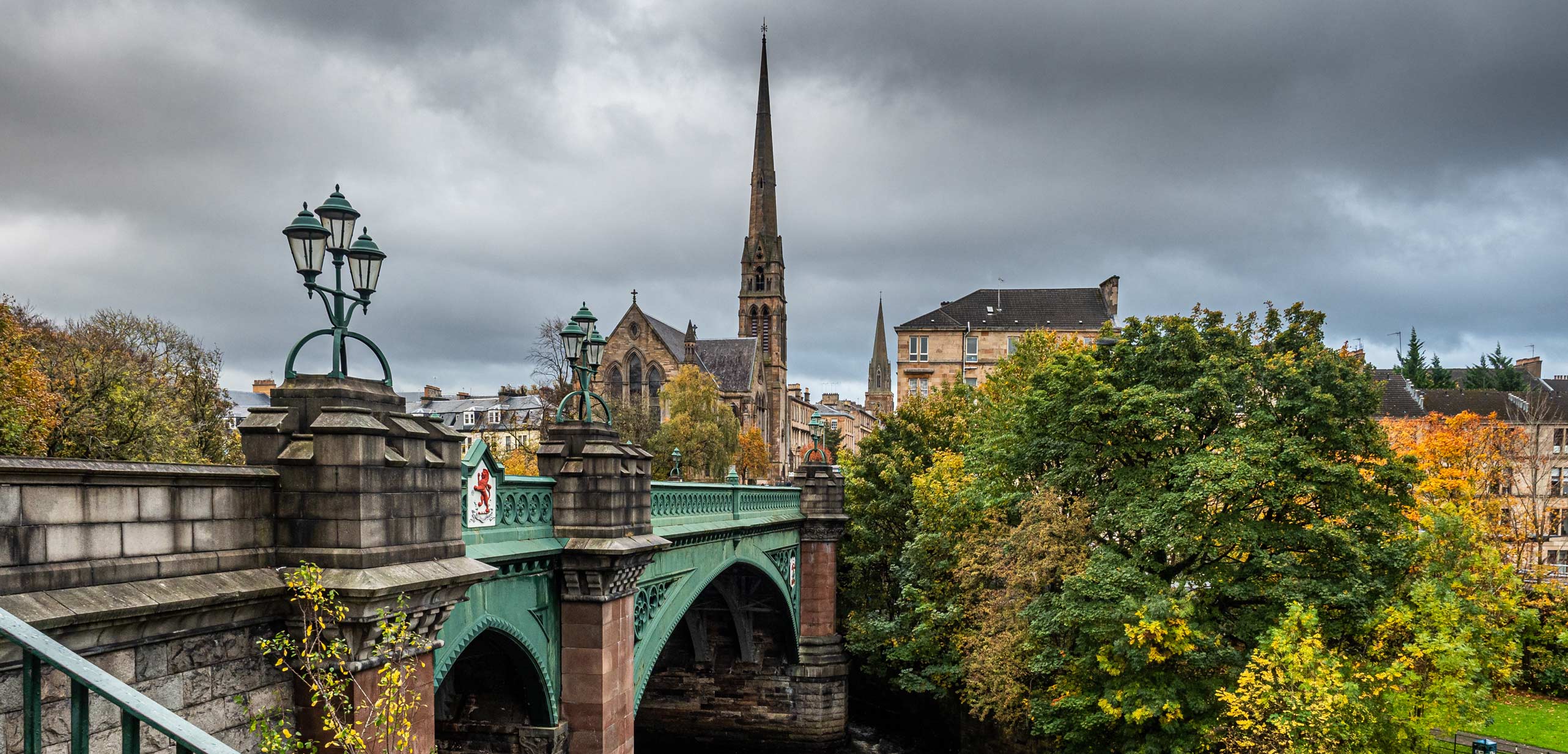 kelvin-bridge-on-great-western-road-glasgow-with-church-spires-in-background-1198305838